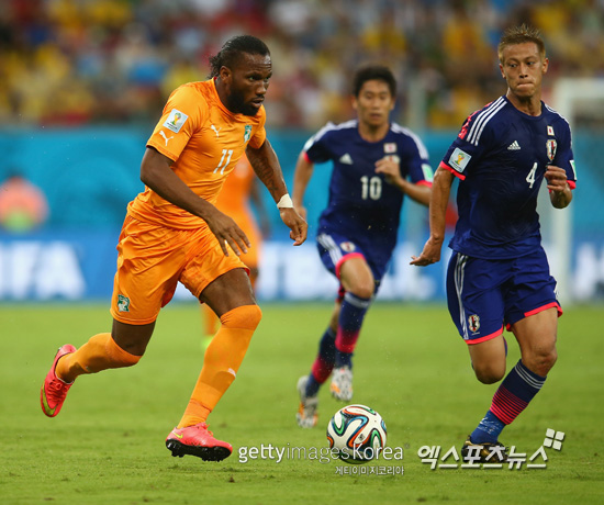 일본 축구 대표팀 주장 하세베 마코토가 자신의 플레이를 '납득 할 수 없다'고 표현했다. ⓒGettyimages/멀티비츠