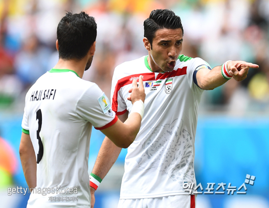 이란을 대표하는 선수 네쿠남(오른쪽) ⓒ Gettyimages/멀티비츠
