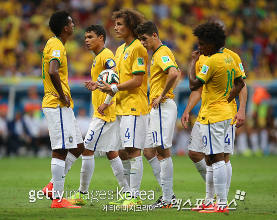13일 브라질 브라질리아에서 열린 2014 브라질월드컵 3-4위전 브라질과 네덜란드의 경기에서 실점을 한 브라질 선수들이 침통한 표정을 짓고 있다. ⓒ Gettyimages/멀티비츠
