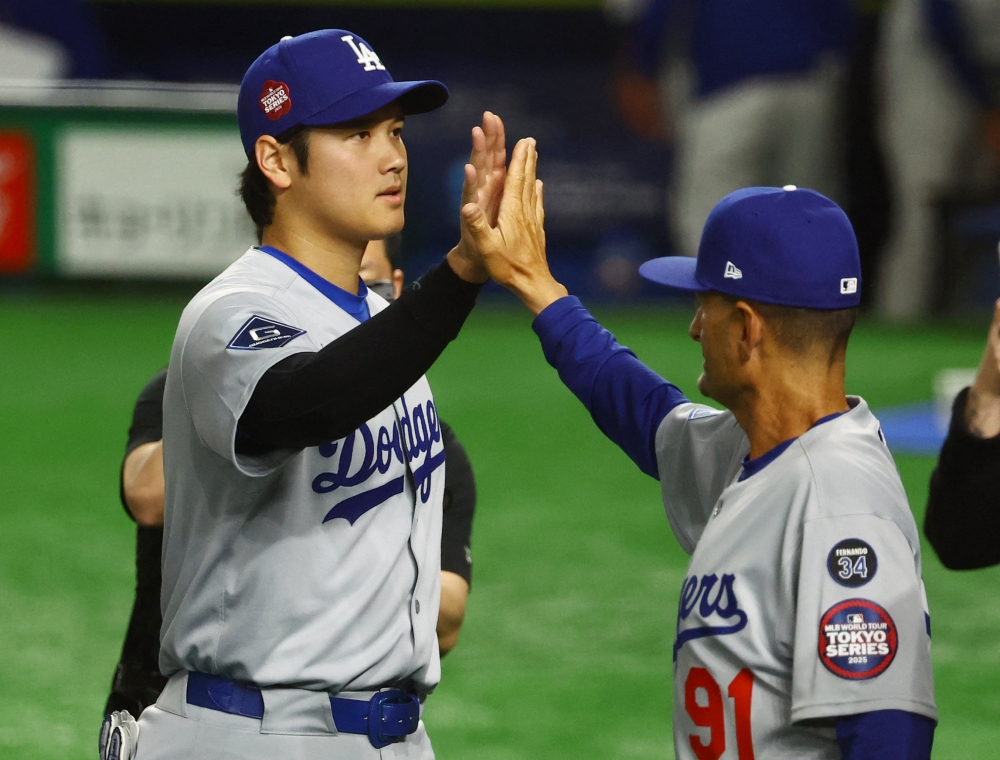 18일 일본 도쿄돔에서 열린 2025 미국프로야구 메이저리그 LA 다저스와 시카고 컵스의 정규시즌 개막 2연전 도쿄시리즈 1차전, 다저스가 4:1로 승리했다. 1번 지명타자로 선발 출전한 오타니 쇼헤이는 5타수 2안타 2득점으로 팀 승리에 기여했다. 로이터 연합뉴스