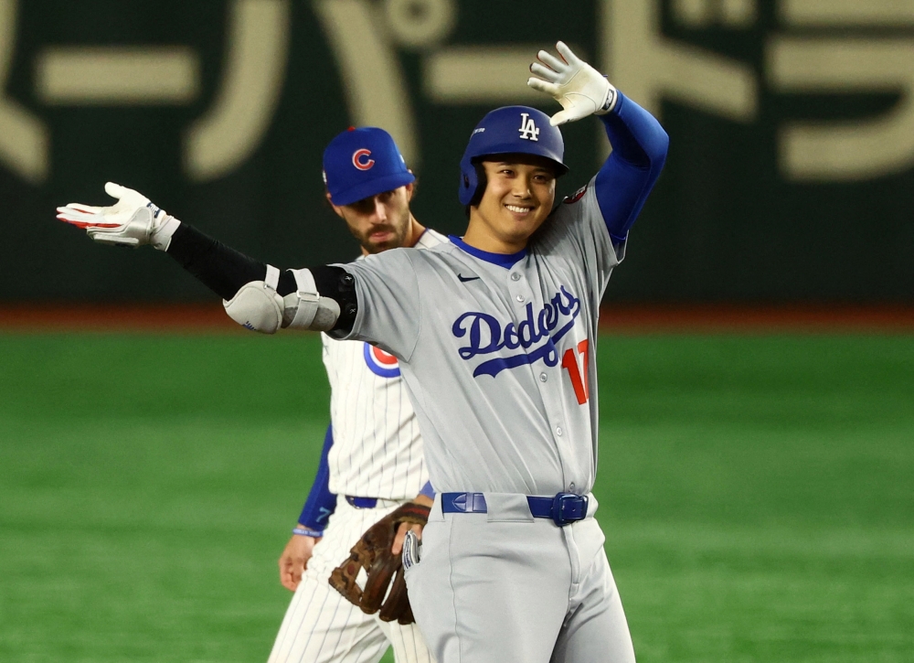 18일 일본 도쿄돔에서 열린 2025 미국프로야구 메이저리그 LA 다저스와 시카고 컵스의 정규시즌 개막 2연전 도쿄시리즈 1차전, 다저스가 4:1로 승리했다. 1번 지명타자로 선발 출전한 오타니 쇼헤이는 5타수 2안타 2득점으로 팀 승리에 기여했다. 로이터 연합뉴스