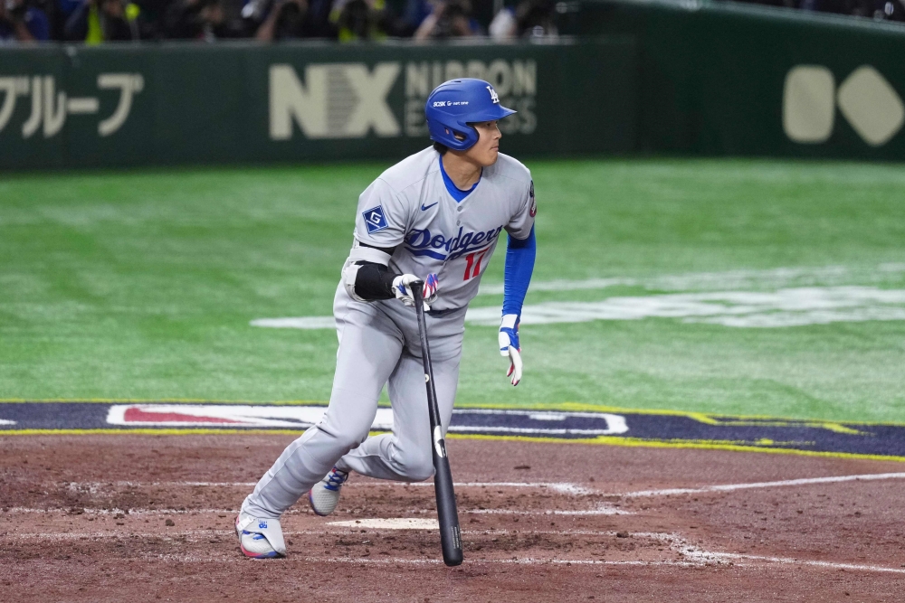 18일 일본 도쿄돔에서 열린 2025 미국프로야구 메이저리그 LA 다저스와 시카고 컵스의 정규시즌 개막 2연전 도쿄시리즈 1차전, 다저스가 4:1로 승리했다. 1번 지명타자로 선발 출전한 오타니 쇼헤이는 5타수 2안타 2득점으로 팀 승리에 기여했다. AFP 연합뉴스