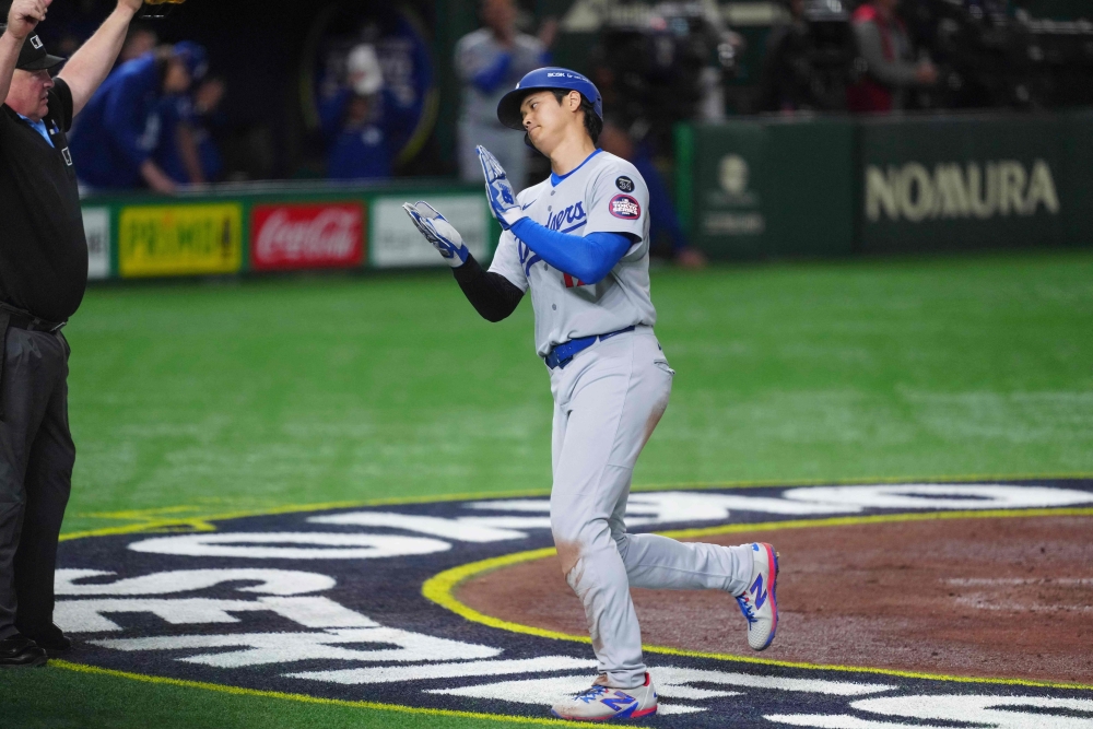 18일 일본 도쿄돔에서 열린 2025 미국프로야구 메이저리그 LA 다저스와 시카고 컵스의 정규시즌 개막 2연전 도쿄시리즈 1차전, 다저스가 4:1로 승리했다. 1번 지명타자로 선발 출전한 오타니 쇼헤이는 5타수 2안타 2득점으로 팀 승리에 기여했다. AFP 연합뉴스
