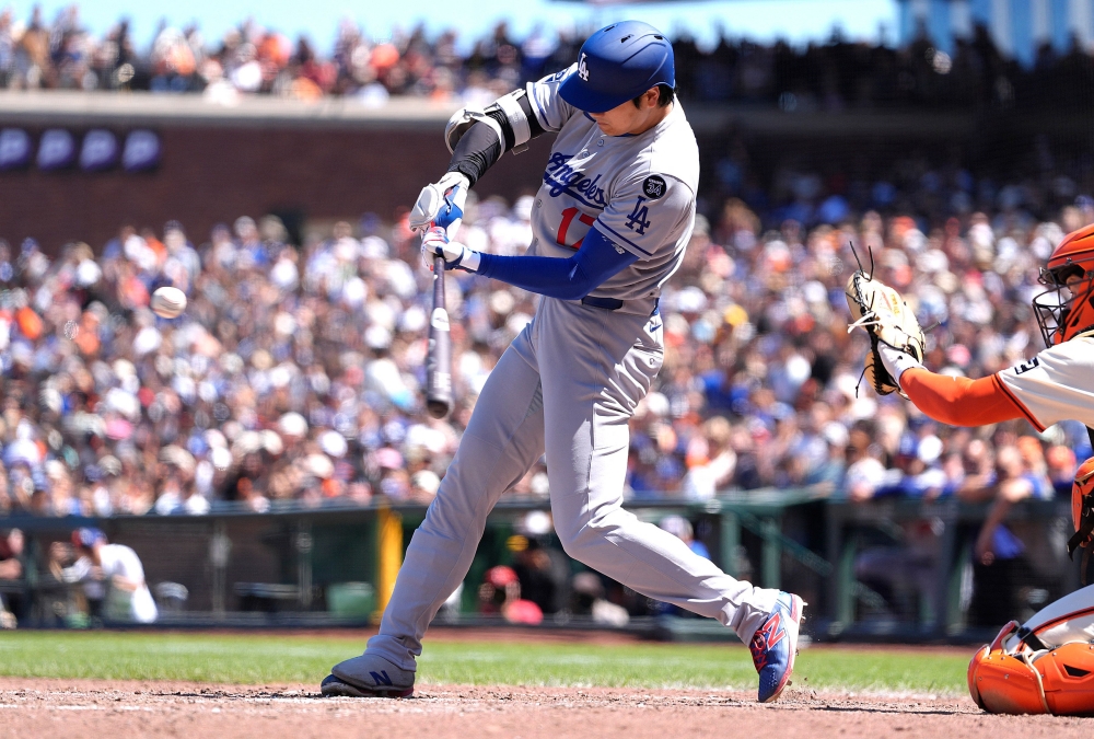 오타니 쇼헤이가 15일 미국 조지아주 애틀랜타의 트루이스트파크에서 열린 2025 미국 메이저리그 올스타 전야제 기자회견에서 선발투수로도 포스트시즌에 나설 수 있게 준비하고 있다고 밝혔다. 다만 2026 월드베이스볼클래식에서 투·타 겸업을 할지에 대해서는 말을 아꼈다. AFP 연합뉴스