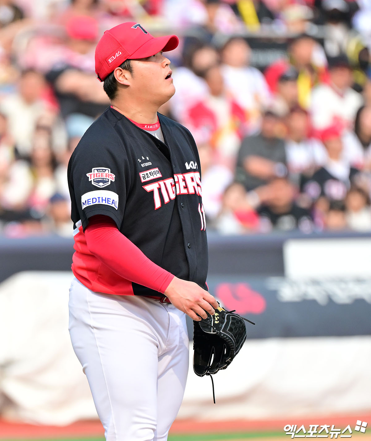 31일 오후 수원KT위즈파크에서 열린 '2025 신한 SOL Bank KBO리그' KIA 타이거즈와 KT 위즈의 경기, 8회말 1사 1루 KIA 조상우가 KT 권동진에게 볼넷을 허용한 후 아쉬워하고 있다. 엑스포츠뉴스 DB