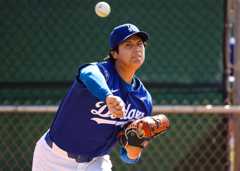 LA 다저스 오타니 쇼헤이가 18일 첫 라이브피칭을 통해 컨디션을 점검했다. 타자 4명을 상대로 총 18구를 던졌으며, 1피안타 2탈삼진을 기록했다. 최고구속은 98마일(약 158km/h)이었다. AFP 연합뉴스