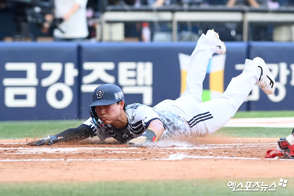 27일 오후 서울 송파구 잠실야구장에서 열린 '2026 신한 SOL KBO리그' 두산 베어스와 KIA 타이거즈의 경기, 3회말 2사 1루 두산 박준순 타석 때 류승민이 홈 쇄도를 하고 있다. 엑스포츠뉴스 DB