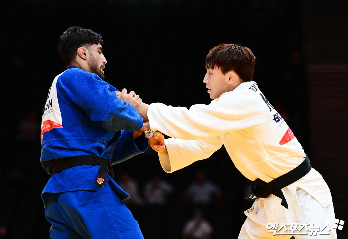 김찬녕이 30일 일본 나고야의 아이치 국제경기장에서 열린 2026 아이치·나고야 아시안게임 남자 유도 66kg 16강에서 이란의 아볼라줄 마흐무디를 한판승으로 제압, 8강에 진출했다. 사진 박지영 기자 